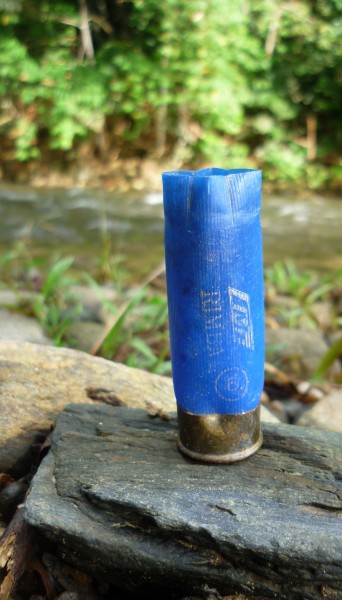 A shotgun shell. This one says '9', meaning 9 pellets are fired   out. Most likely to hunt boars 